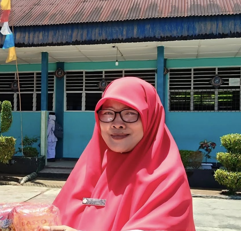 Niko Srirahayu, S.Ag